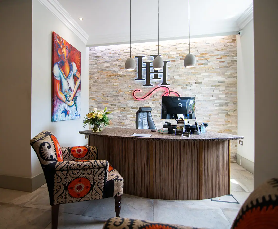 Reception, with the HH monogram on the wall