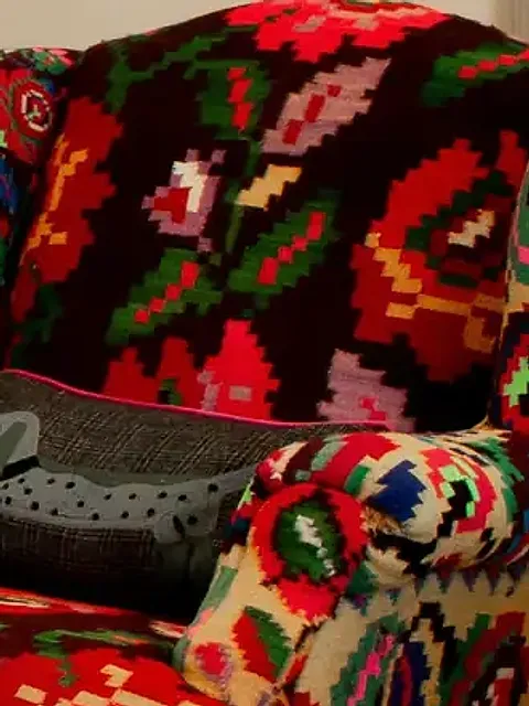 Close-up of a patterned armchair in a sitting room