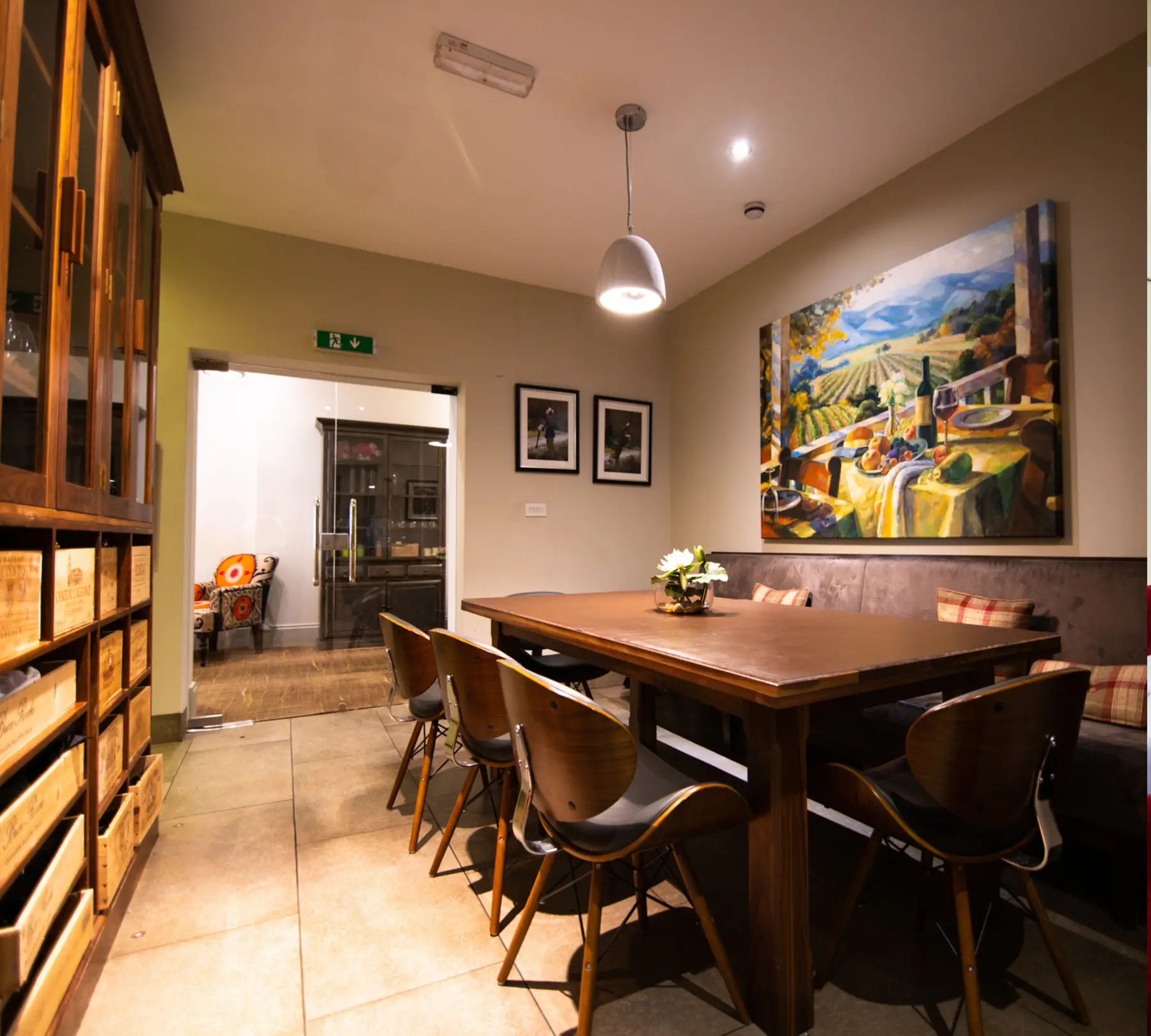 The Wine Room, with a long table and wine shelves